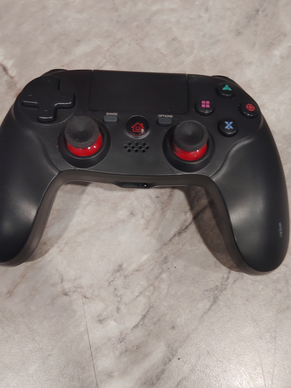 Wireless Black Gaming Controller with Red Accents